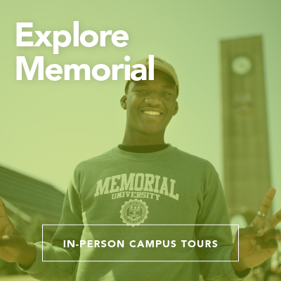 A smiling university student outside the Memorial clock tower